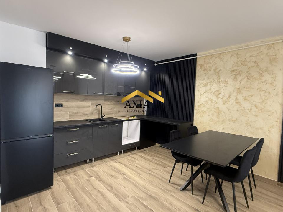 Apartament modern cu 2 camere, terasă și parcare subterană generoasă – Florești,