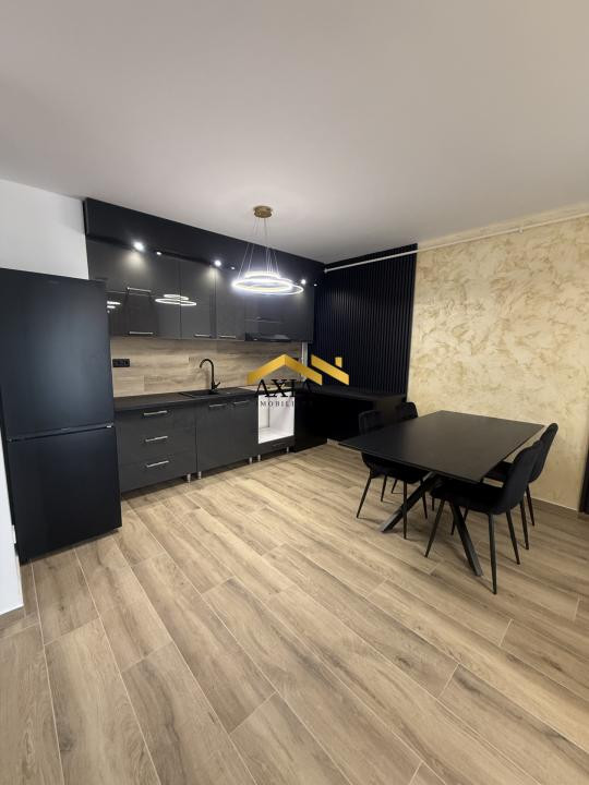 Apartament modern cu 2 camere, terasă și parcare subterană generoasă – Florești,