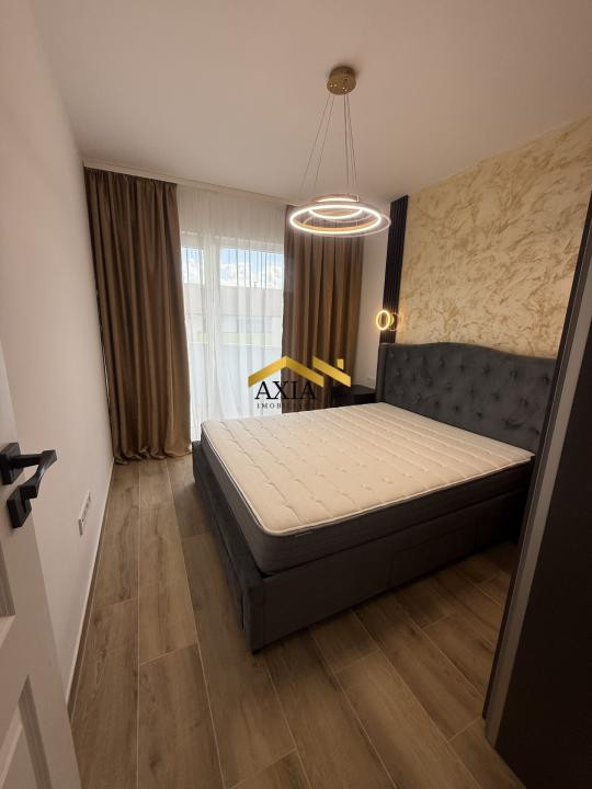Apartament modern cu 2 camere, terasă și parcare subterană generoasă – Florești,