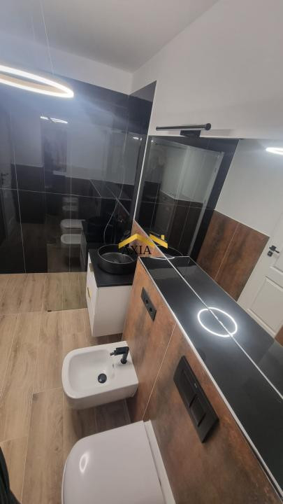 Apartament modern cu 2 camere, terasă și parcare subterană generoasă – Florești,
