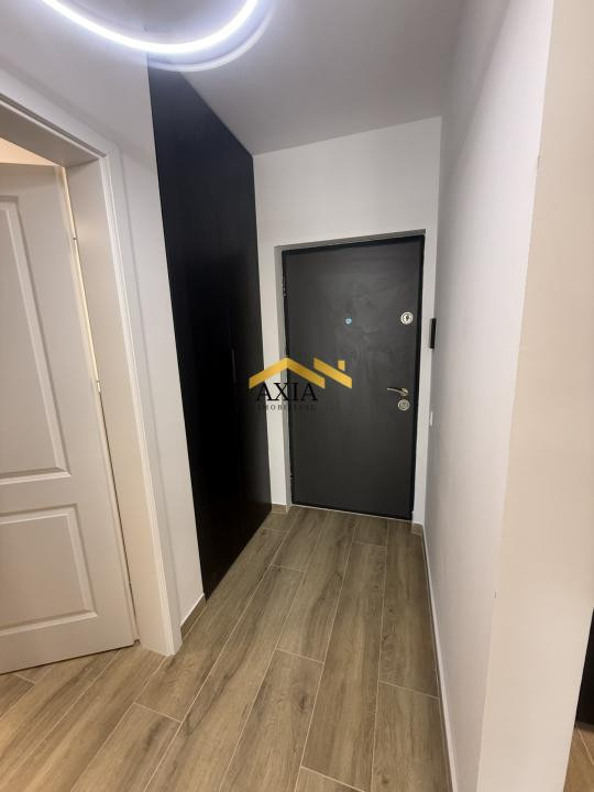 Apartament modern cu 2 camere, terasă și parcare subterană generoasă – Florești,